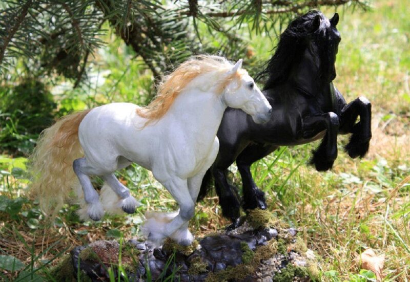 White and Black Horse Figurines