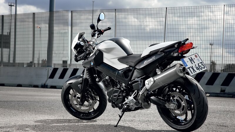 White and Black Motorcycle — Neutral, Afternoon, Photograph, Fence
