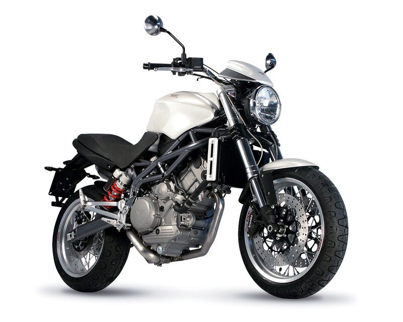 White and Black Motorcycle — Photograph, Seat