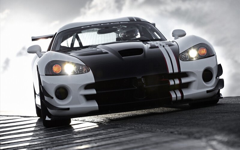 White and Black Race Car — Dramatic, Photograph, Race Track