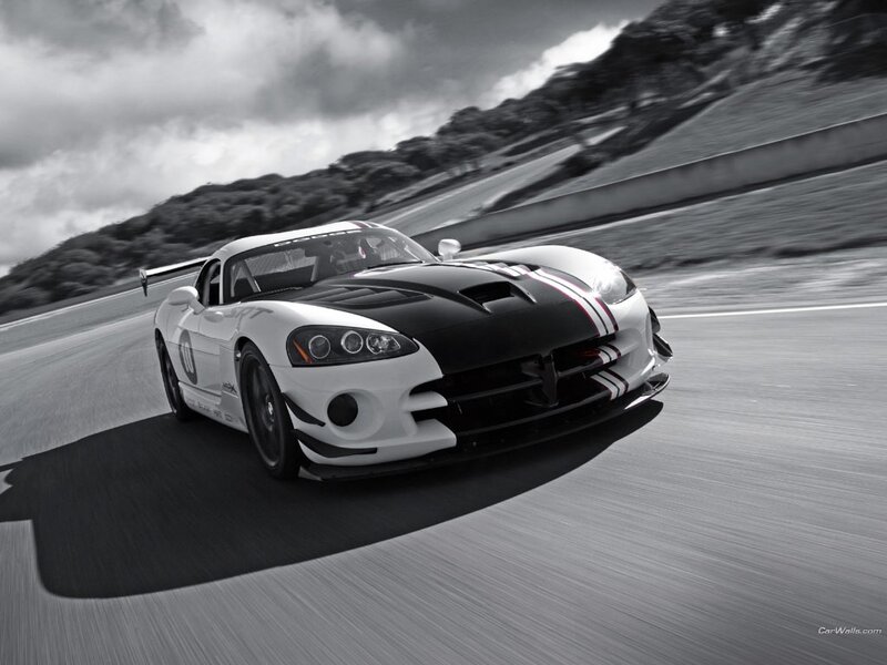 White and Black Race Car — Dynamic, Photograph, Race Track, Hills, Cloudy Sky