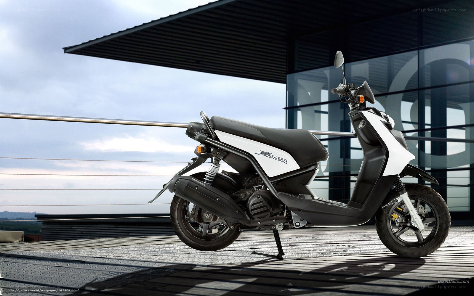 White and black scooter on deck