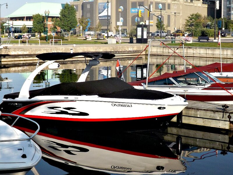 White and Black Speedboat — Calm
