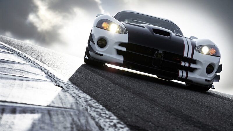 White and Black Sports Car — Dramatic, Photograph, Race Track, Headlights, Clouds
