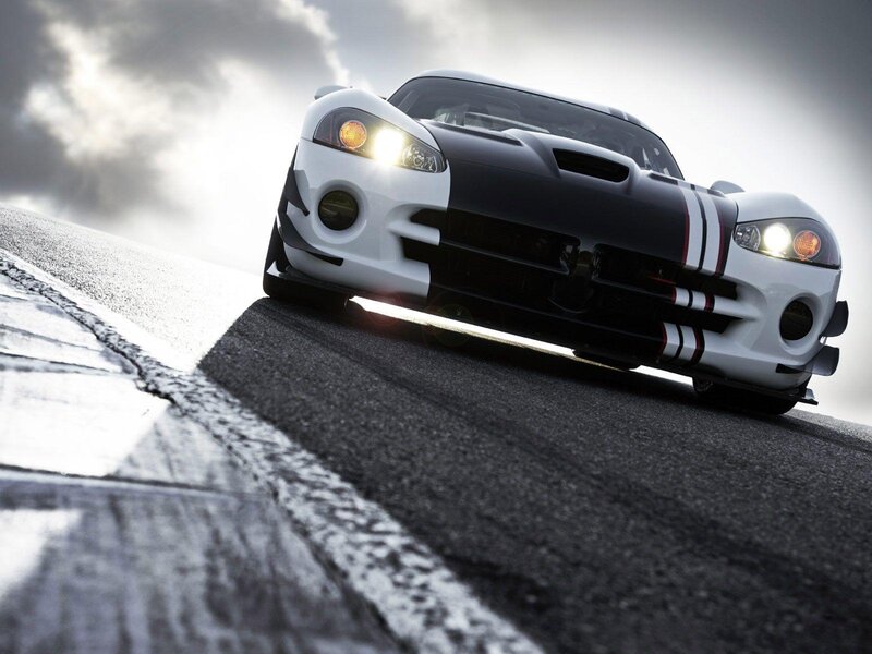 White and Black Sports Car — Dramatic, Photograph, Race Track