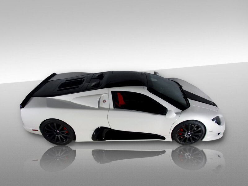 White and Black Sports Car — Neutral, Photograph, Black Wheels