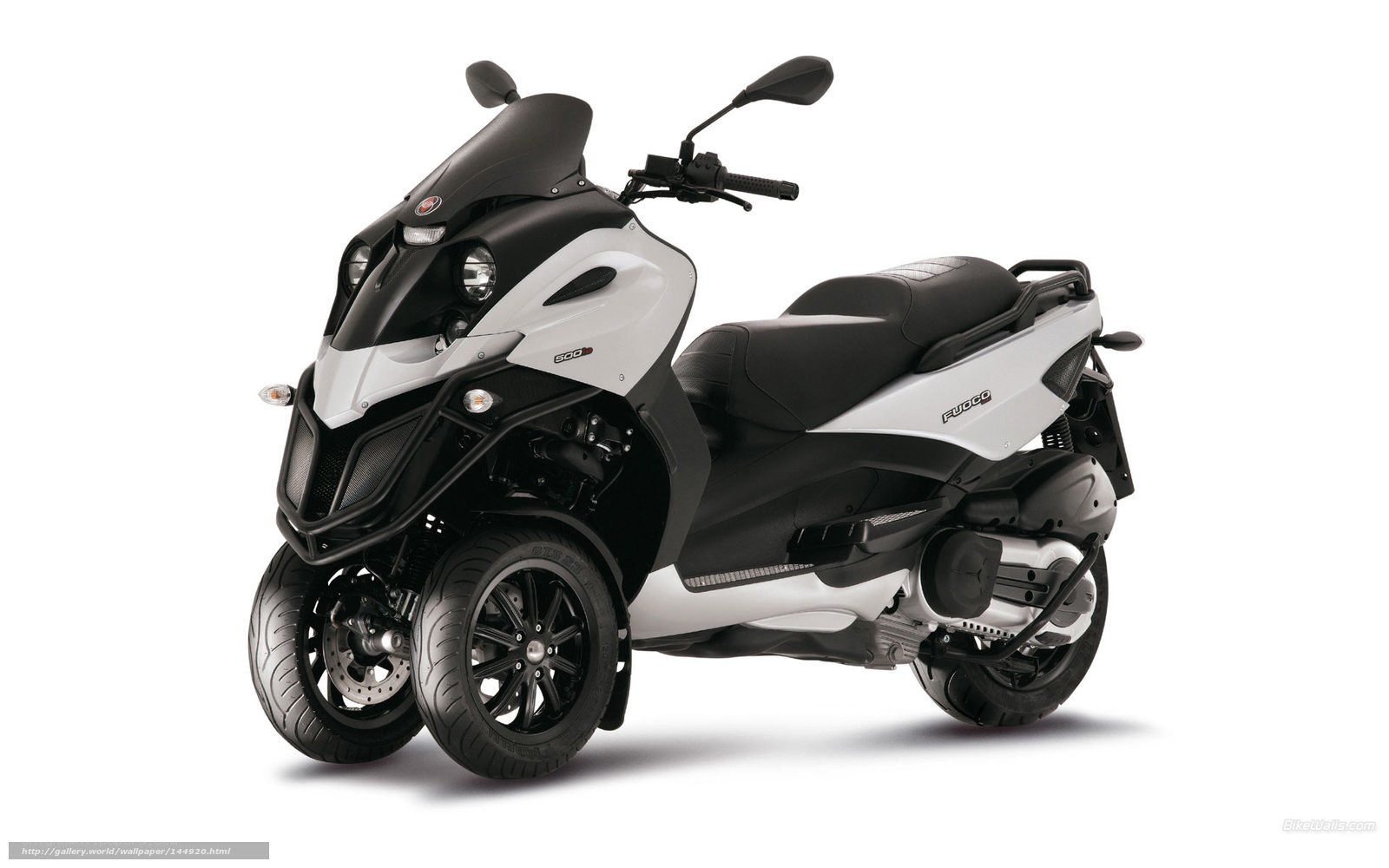 white and black three-wheeled scooter