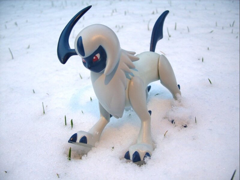 White and Black Toy Figure