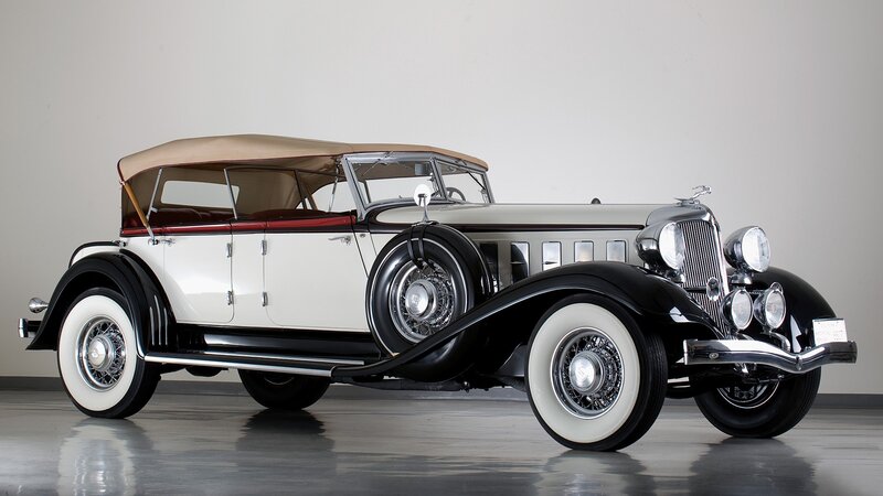 White and Black Vintage Car