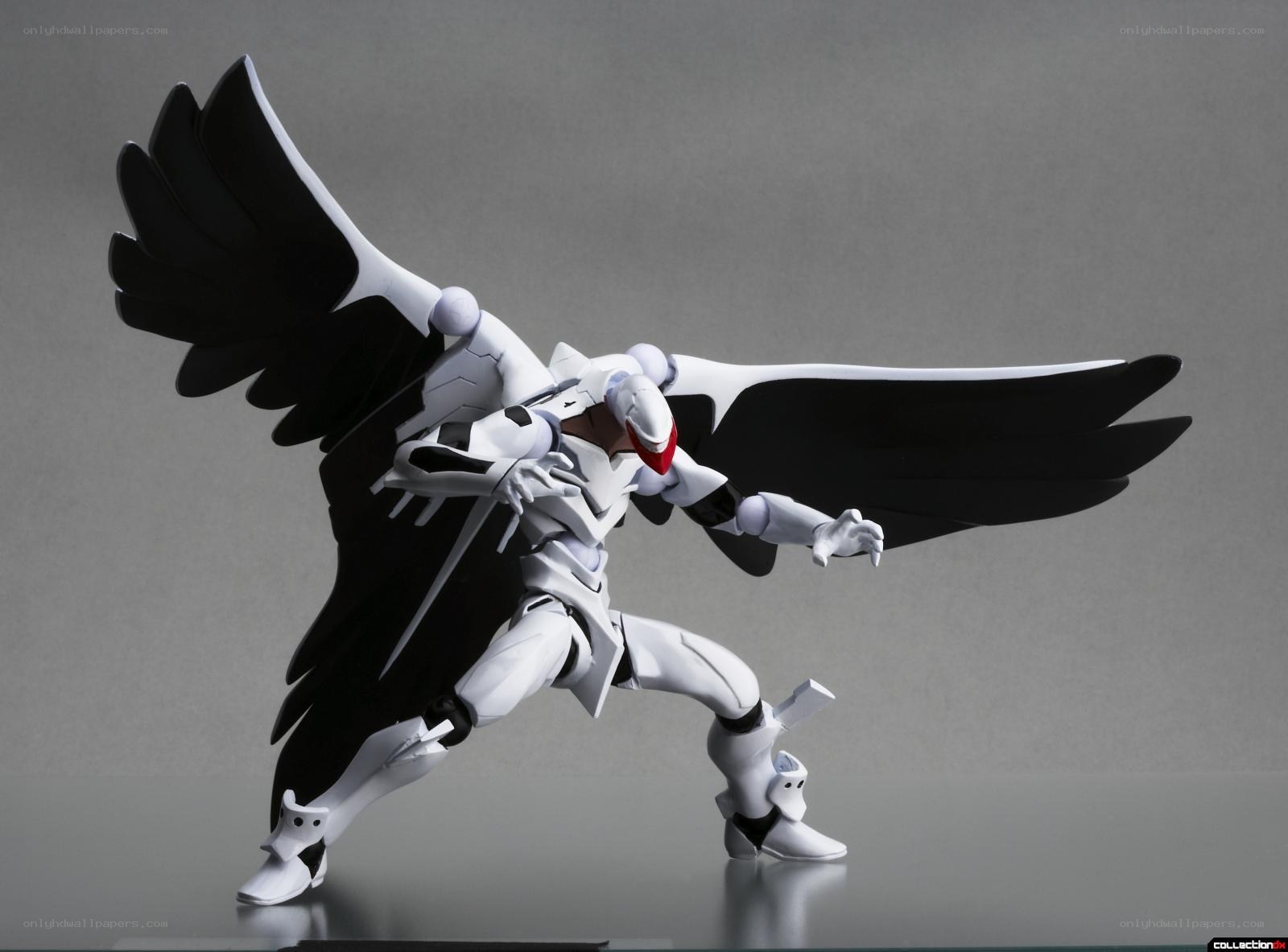 white and black winged robot figure