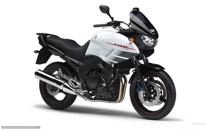 White and black Yamaha TDM motorcycle