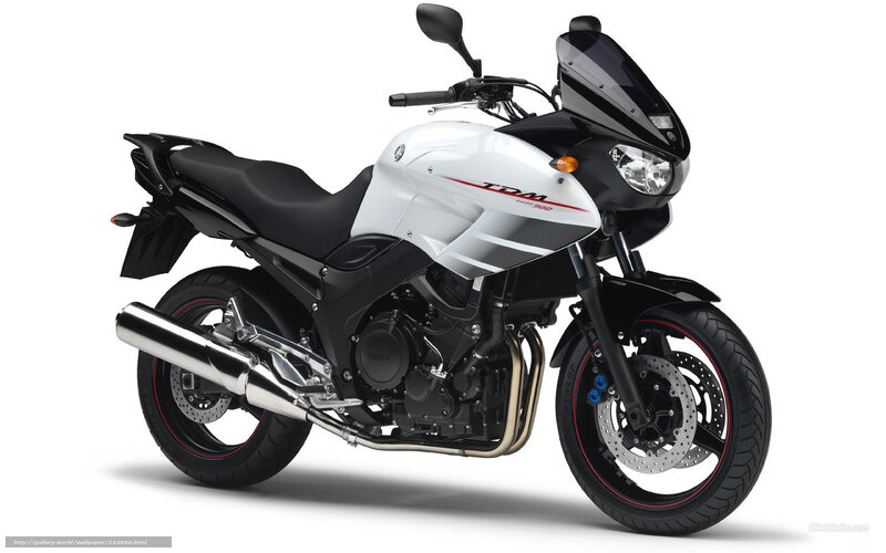White and black Yamaha TDM motorcycle