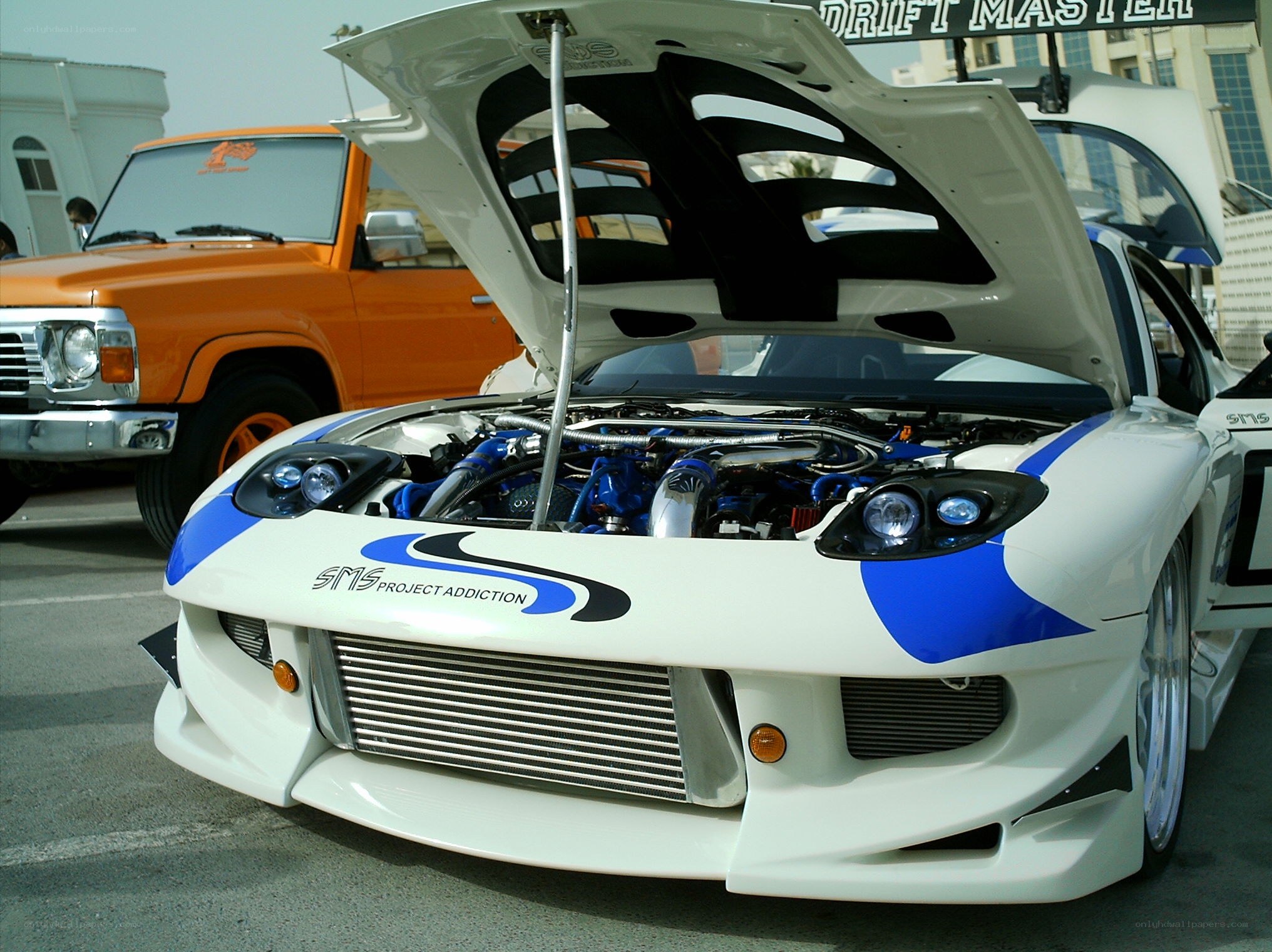 white and blue drift car