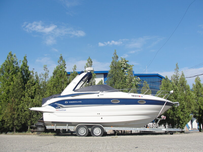 White and Blue Motorboat