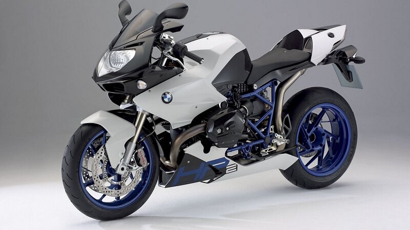 White and Blue Motorcycle — Neutral, Photograph, Blue Wheels, Black Seat