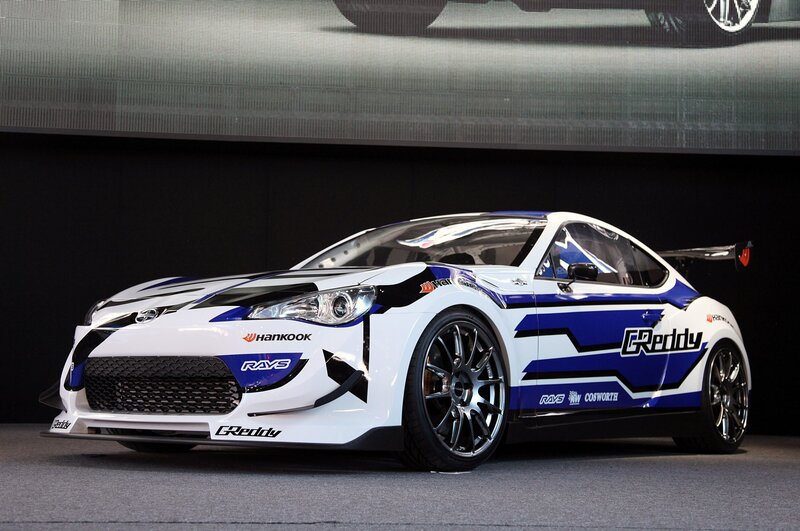 white and blue race car