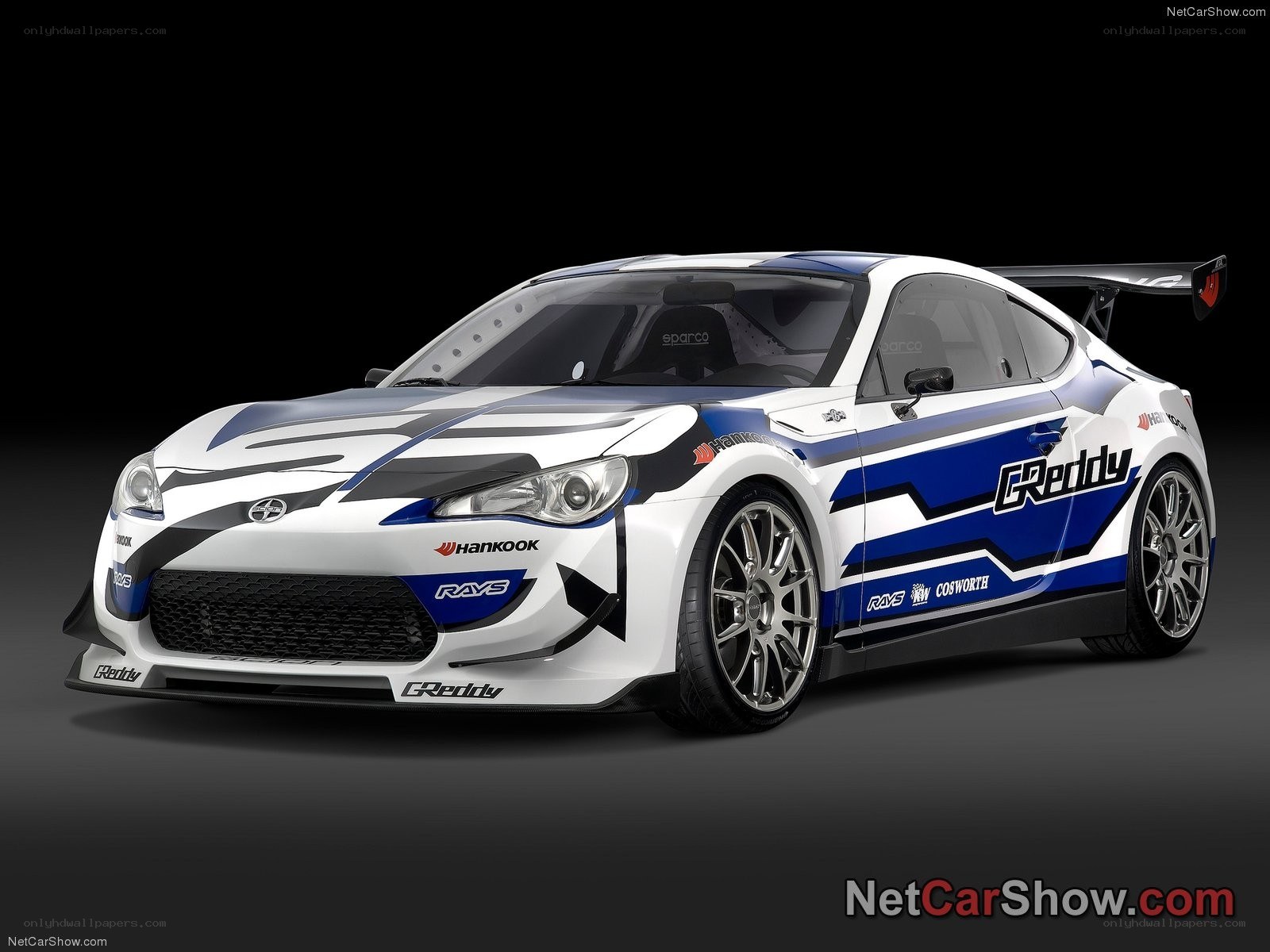 white and blue race car