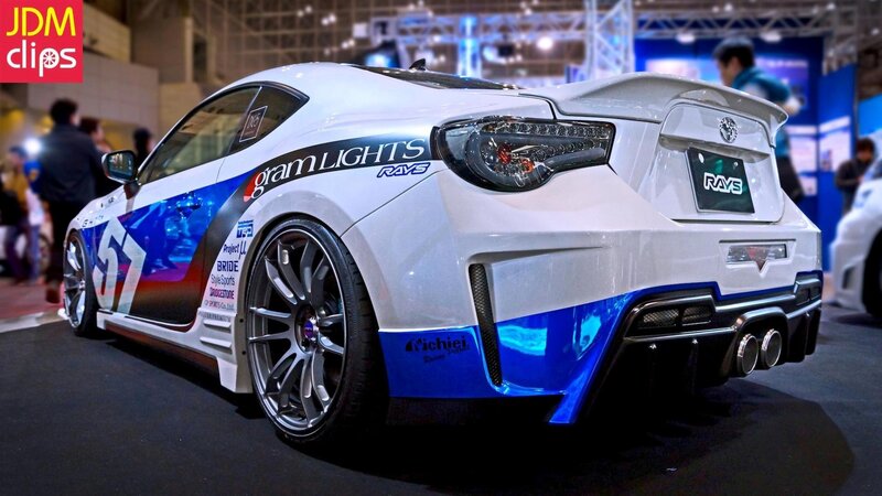 White and Blue Race Car — Dynamic, Photograph, People