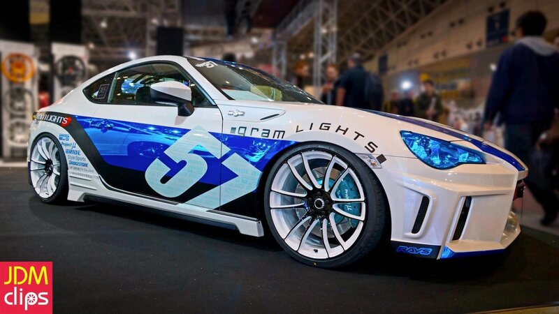 White and Blue Race Car — Dynamic, Photograph, Show Floor