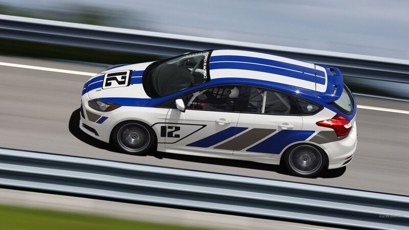 white and blue race car on track