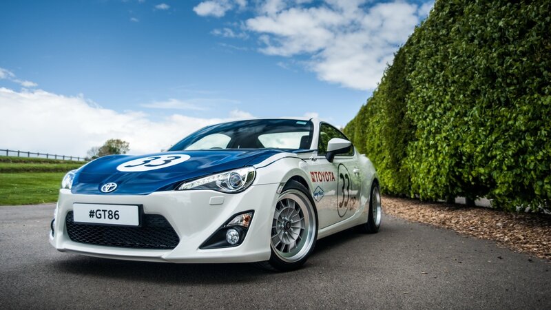 White and Blue Race Car — Serene