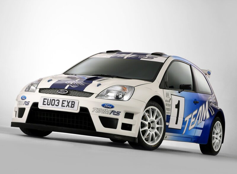 white and blue rally car