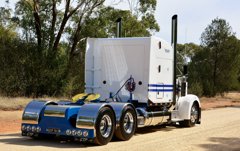 White and Blue Semi-truck — Outdoor