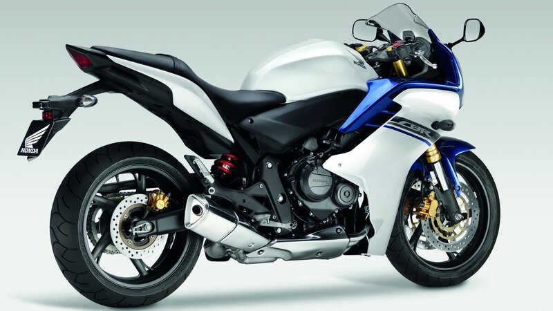 white and blue sport motorcycle