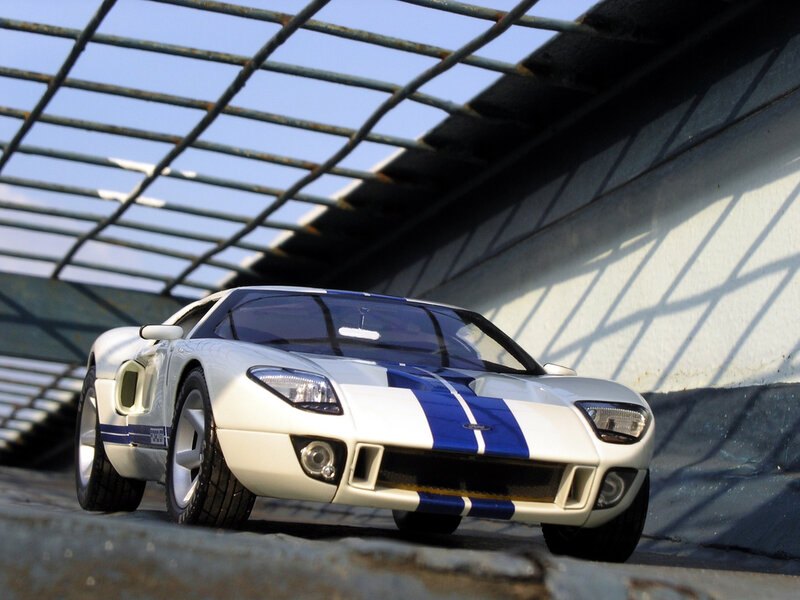 white and blue sports car
