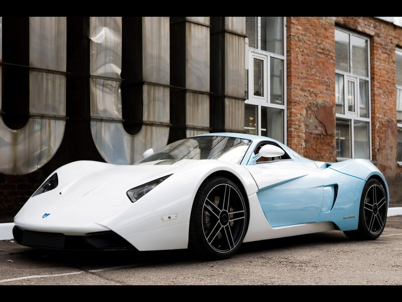 white and blue sports car