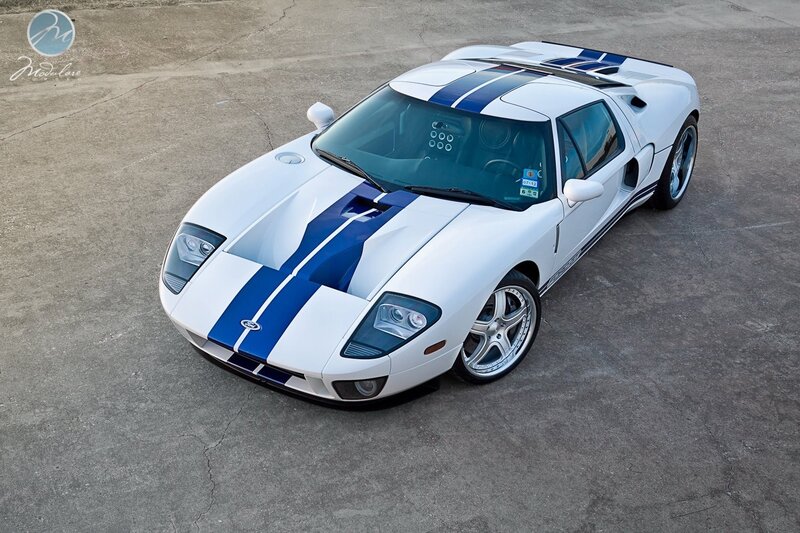 White and Blue Sports Car — Calm, Photograph, Concrete Surface, Stripes