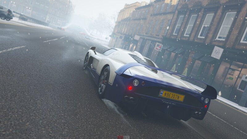 White and Blue Sports Car — Gray
