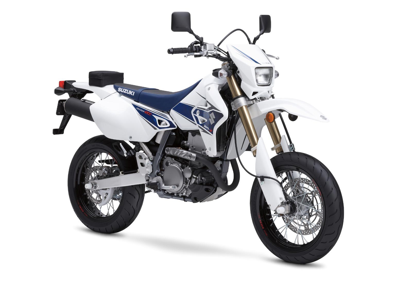 white and blue Suzuki motorcycle