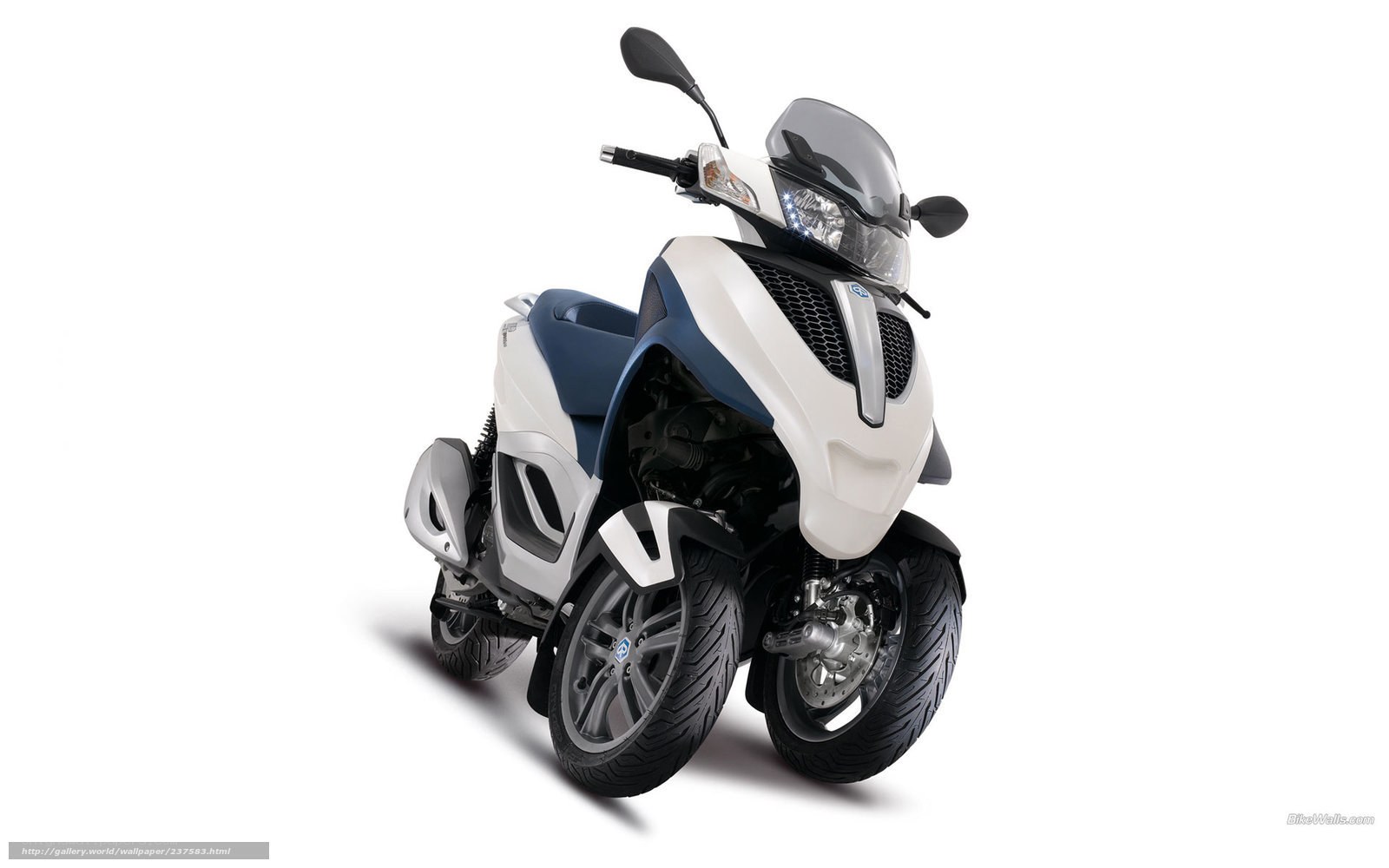 white and blue three-wheeled scooter
