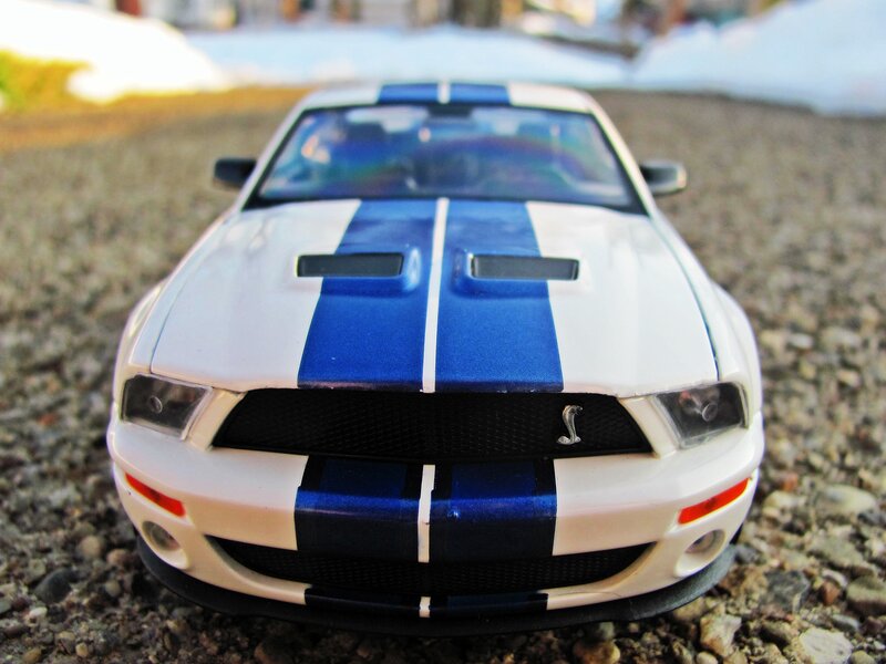 White and Blue Toy Car
