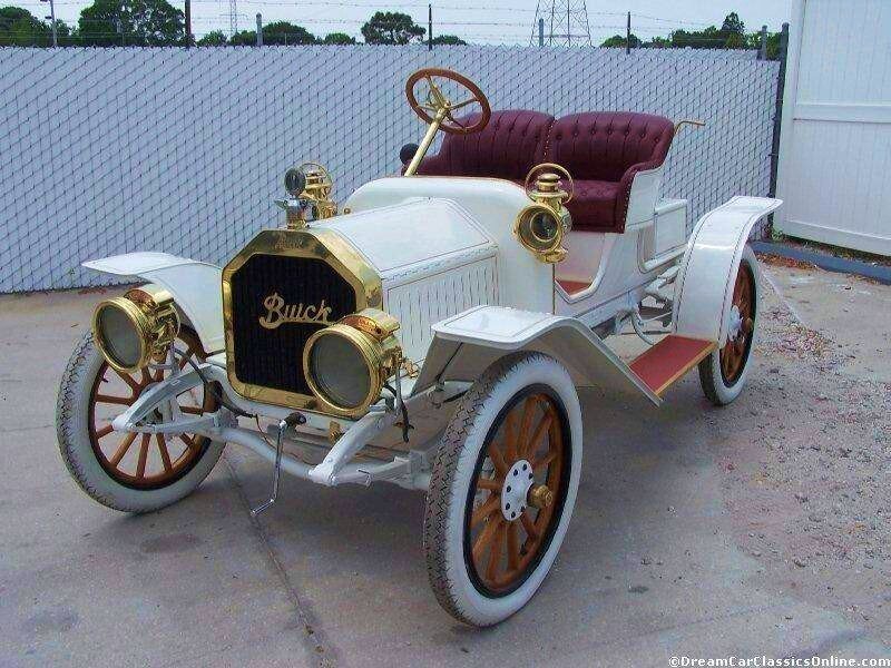 White and gold Buick vintage car