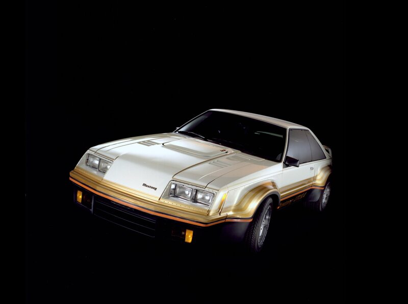 White and gold Mustang coupe