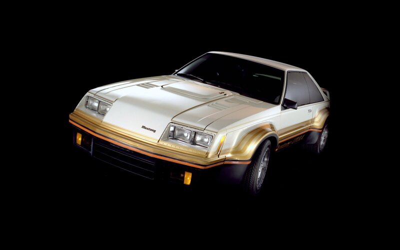 White and gold Mustang coupe