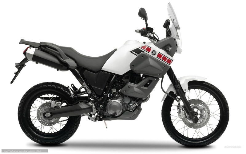 white and gray adventure motorcycle