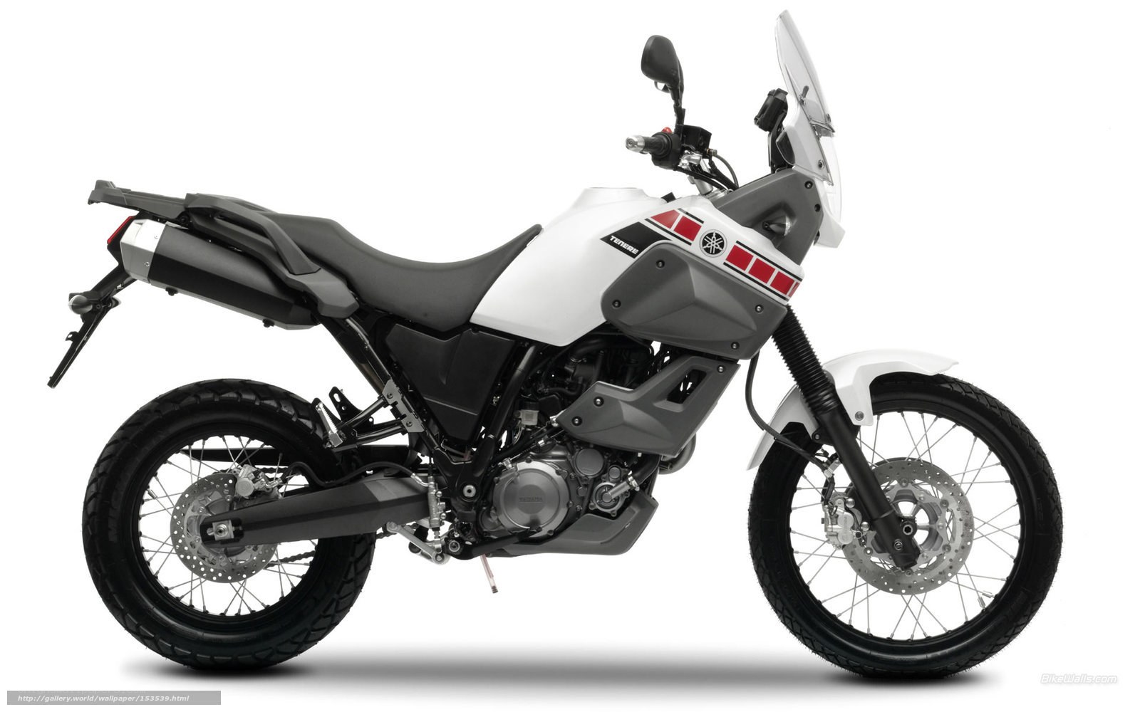 white and gray adventure motorcycle
