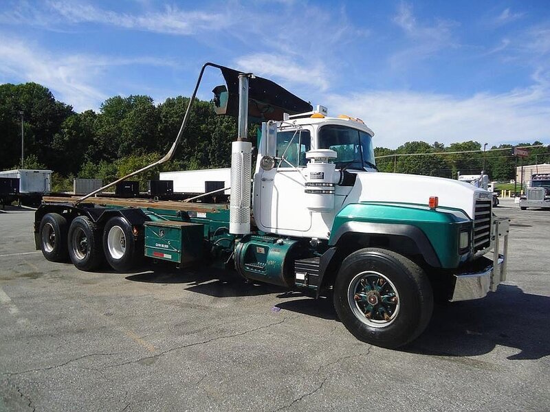 White and Green Dump Truck