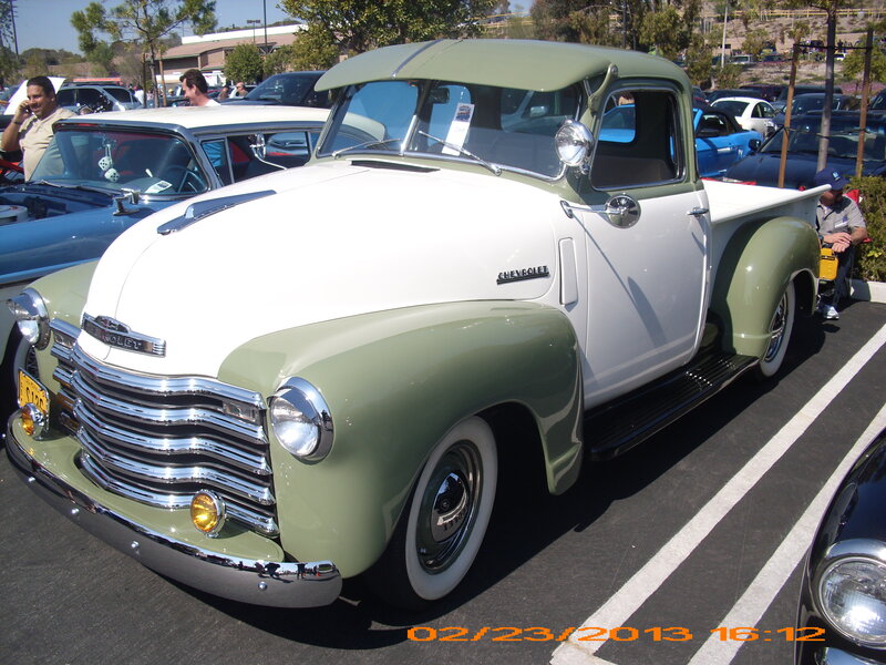 White and Green Pickup Truck