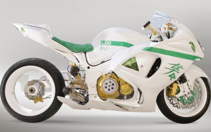 white and green sport motorcycle