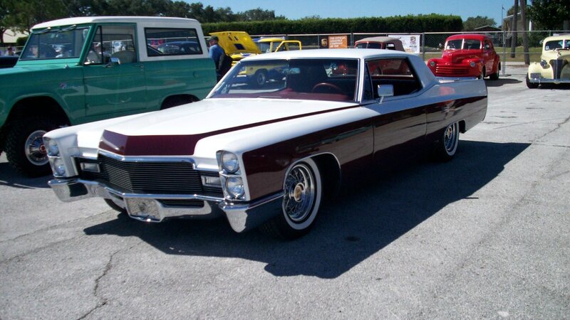 White and Maroon Car — Outdoor