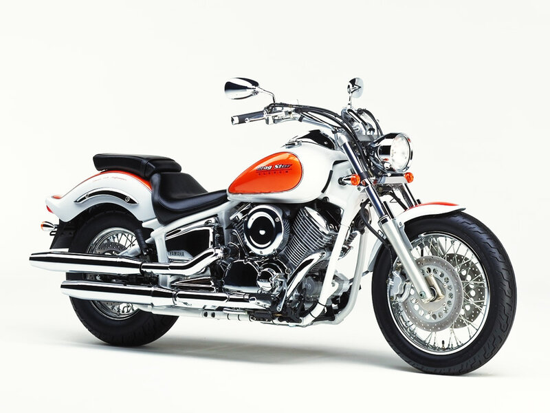 White and Orange Motorcycle — Neutral