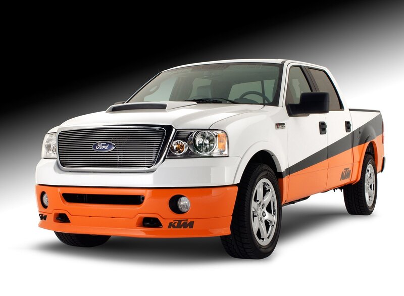 white and orange pickup truck