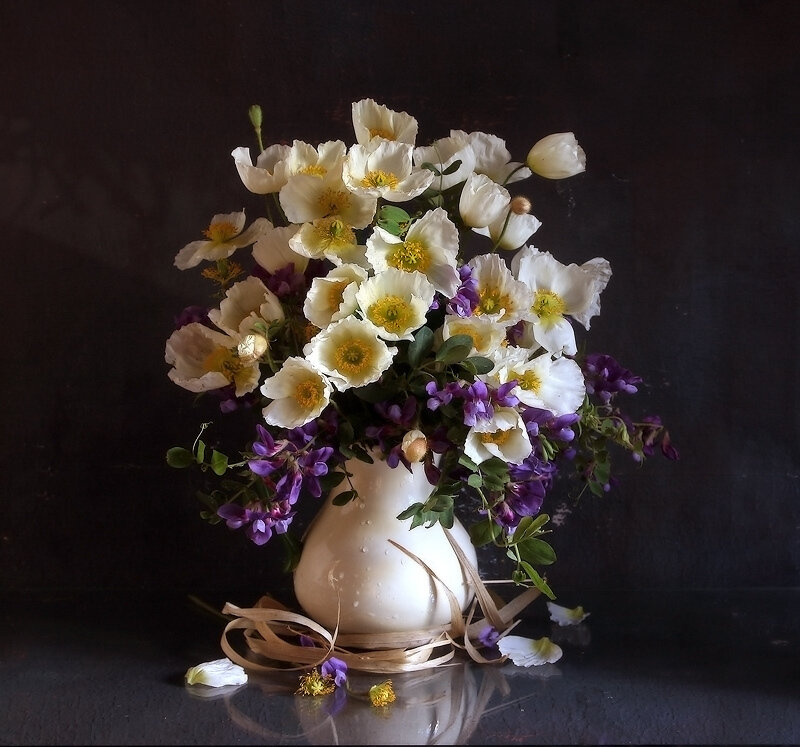 White and purple flowers in a vase