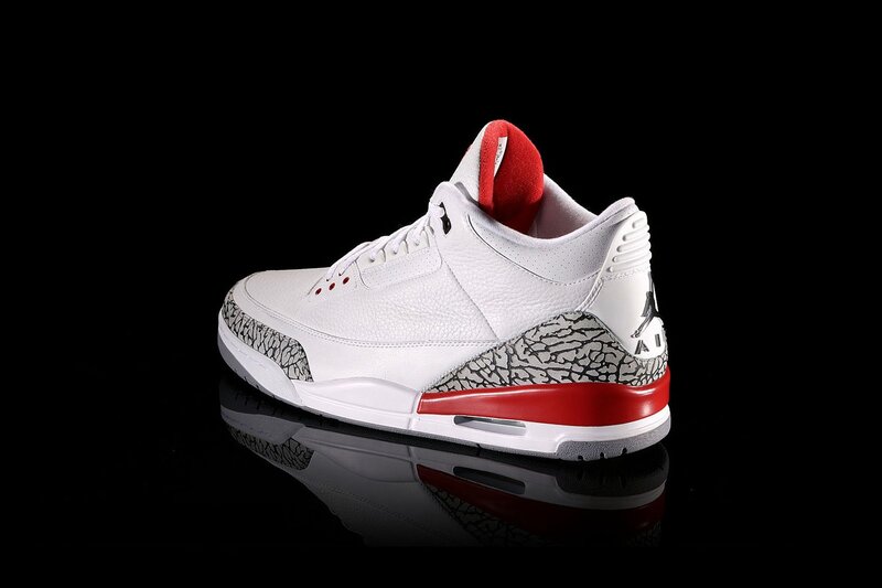 white and red air jordan sneaker