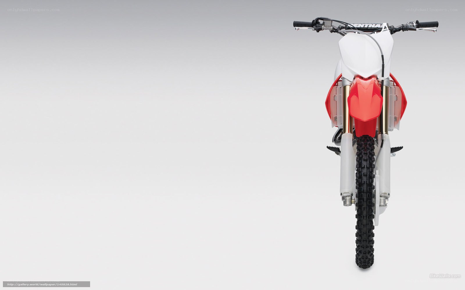 white and red dirt bike