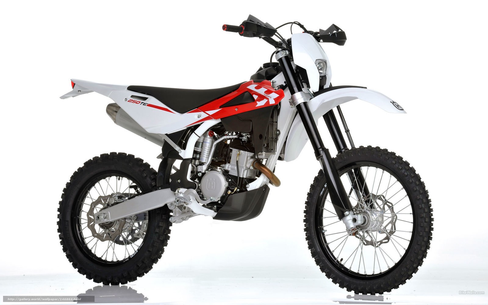 white and red dirt bike